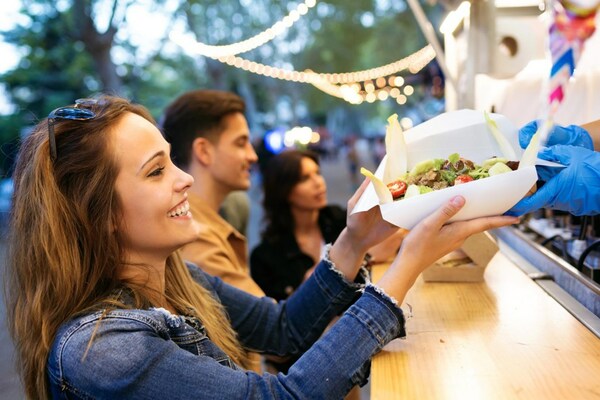 woman getting taco